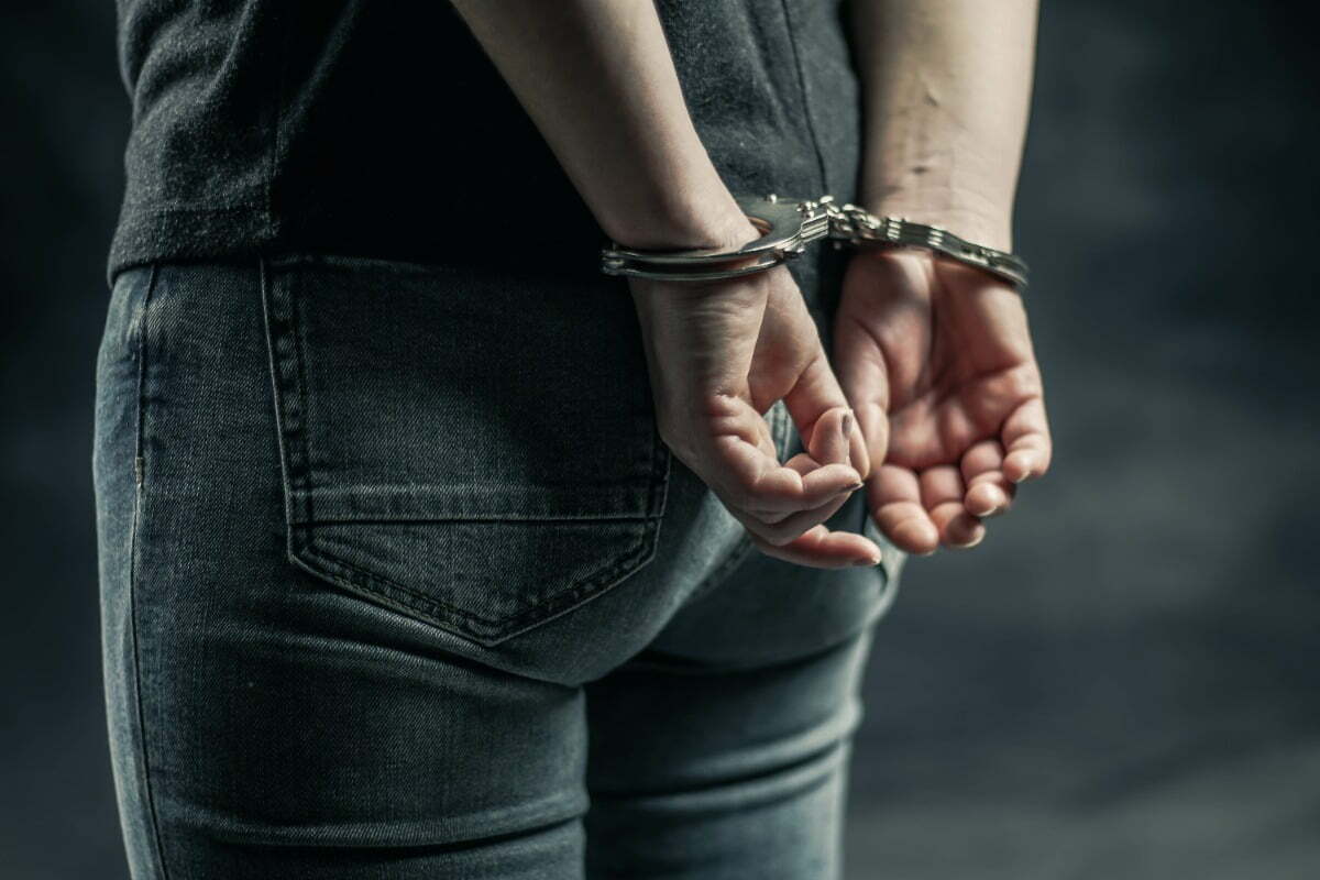woman in handcuffs